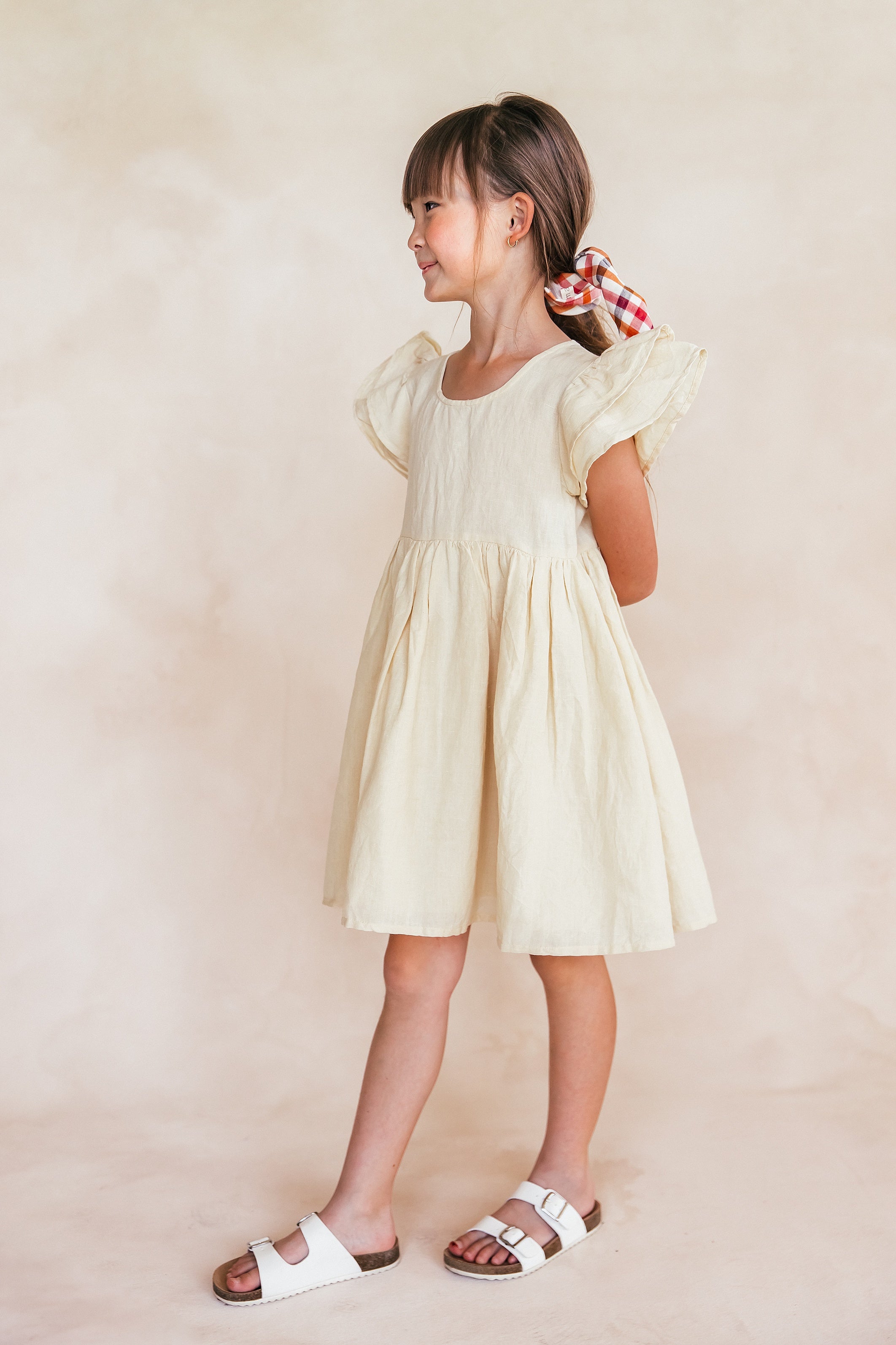 Buttercup Creme Flutter Sleeve Dress